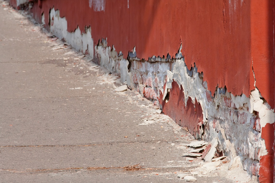 Saltpetre or saltpeter on old grunge wall basis