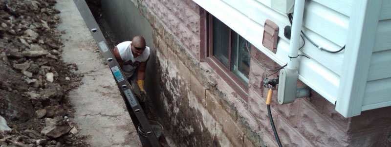 foundation worker in trench