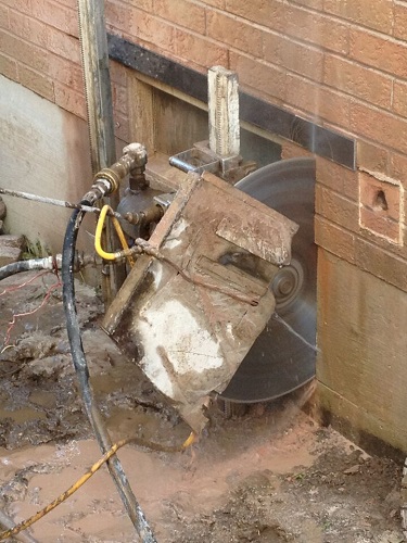 cutting into foundation wall